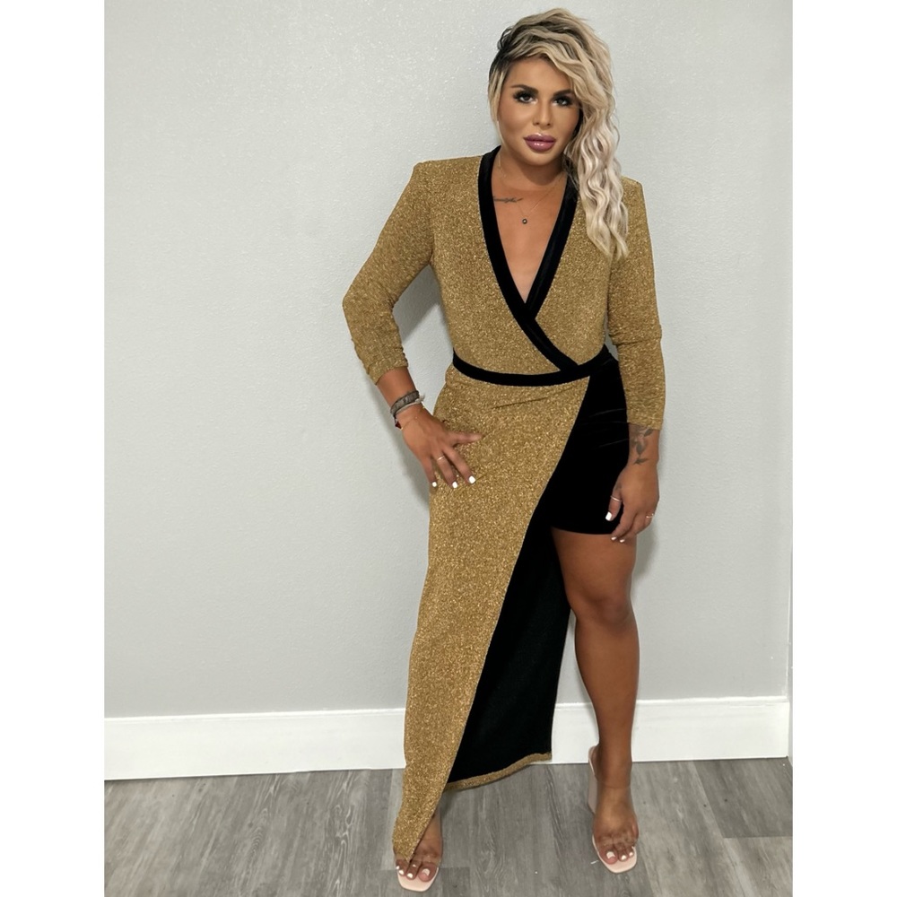 asymmetrical gold and black romper size L